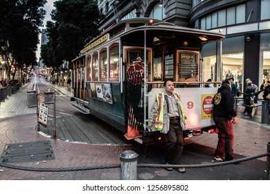 San Francisco, CA - August 6, 2017: Worker At Powell Station Manually Turn The Street Car Heading Using A Turntable