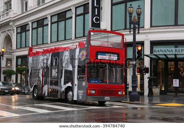 San Francisco, CA - December 24, 2015: San Francisco\
Deluxe Sightseeing Tour, one of major sightseeing companies in San\
Francisco, is the first San Francisco Sightseeing Tour to use\
Natural Gas Bus.