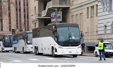 San Francisco, CA - Jan 25, 2020: Charter Buses Busing Hundreds Of Participants Into Civic Center Plaza For The 16th Annual Walk For Life Rally And March. Police Directing Traffic.