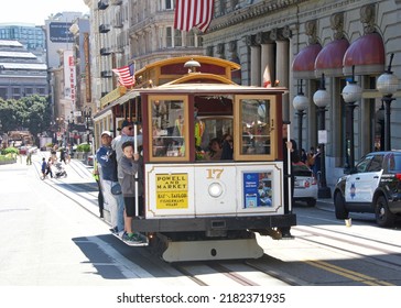 San Francisco, CA - July 17, 2022: Historic iconic trolley cars at Powell and Market street. Traveling on Powell Street to and from Fisherman's wharf
