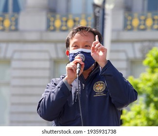 San Francisco, CA - Mar 13, 2021: California Assembly member David Chiu speaking to participants during the Open the Schools Rally at Civic Center in front of City Hall.