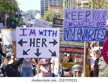 San Francisco, CA - May 14, 2022: Unidentified Participants Marching In The Streets Holding Signs In Support Of Reproductive Justice And A Woman’s Right To Choose.