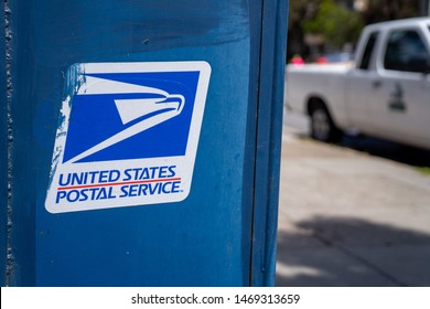 San Francisco, CA MAY 19, 2019: United States Postal Service USPS, Logo And On Mail Box On Sidewalk