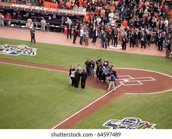 SAN FRANCISCO, CA - OCTOBER 28: Camera Crews Film As Tim Wakefield Shakes Hands With The Clemente Family Game 2 Of The 2010 World Series Game Between Giants And Rangers Oct. 28, 2010 AT&T Park San F