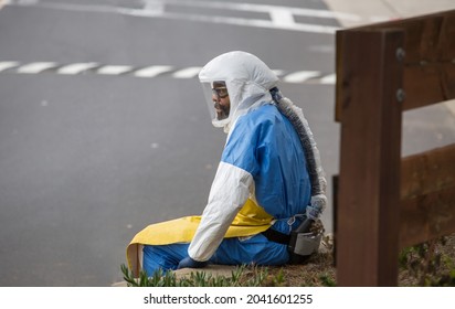 San Francisco, CA, USA, 9 11 2021, A Medic Sitting Outside The Hospital In A Bio Weapon Protective Suit In A Daytime