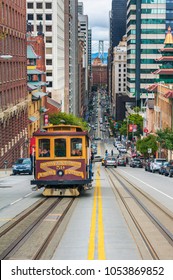 San Francisco, CA, USA - April 4, 2013: Vintage Cable Car going uphill in California Street, San Francisco, USA. Only 3 of once 23 railway lines remain today.