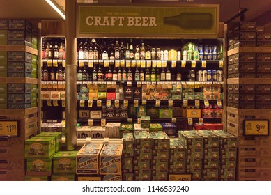 SAN FRANCISCO, CA, USA - JUL 17, 2018:Wide Selection Of Domestic And Imported Beer At Grocery Store Open Fridge. Various Bottles Of Craft, Microbrews, IPAs, Worldwide On Display. Alcohol Background