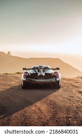 San Francisco, CA, USA
March 24, 2022
Pagani Huayra Roadster Parked On Dirt Viewed From The Rear With Blue Skies Overhead