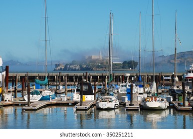 San Francisco, California - June 19 2011: Sail Boat Parking at the Port in San Francisco with Alcatraz as a backdrop.