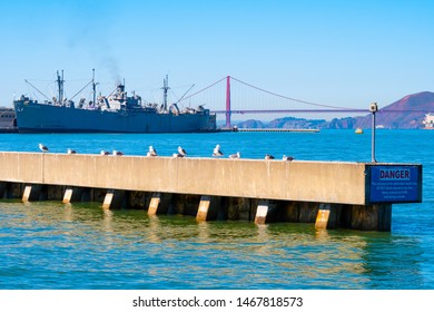 San Francisco, California - October 05 2017: San Francisco, California. SS Jeremiah Obrien Warship Vessel And Golden Gate Bridge On Summer Day In The Bay Area On The West Coast In America.