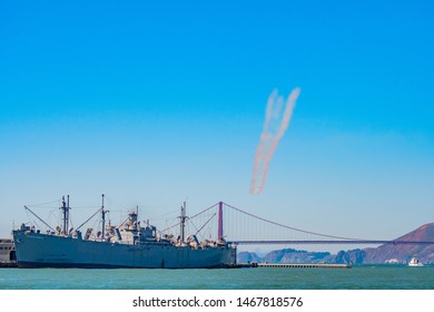 San Francisco, California - October 05 2017: San Francisco, California. SS Jeremiah Obrien Warship Vessel And Golden Gate Bridge On Summer Day In The Bay Area On The West Coast In America.