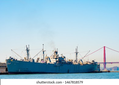 San Francisco, California - October 05 2017: San Francisco, California. SS Jeremiah Obrien Warship Vessel And Golden Gate Bridge On Summer Day In The Bay Area On The West Coast In America.