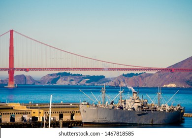 San Francisco, California - October 05 2017: San Francisco, California. SS Jeremiah Obrien Warship Vessel And Golden Gate Bridge On Summer Day In The Bay Area On The West Coast In America.