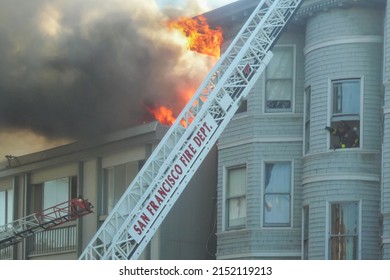 San Francisco, California, United States Of America. August, 2007. San Francisco Fire Department. Firefighters Putting Out A House Fire In The City Of San Francisco.