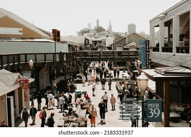 San Francisco, California, United States - June 23 2022: People Exploring Pier 39, A Shopping Center And Popular Tourist Attraction Built On A Pier In San Francisco, California. 