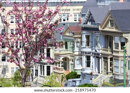 San Francisco, California, United States - city view with famous Painted Ladies, Victorian homes at Alamo Square (Western Addition neighborhood).
