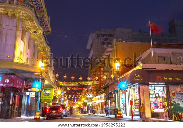 San\
Francisco, California, United States - August 16, 2019: Chinese\
lanterns lit at entrance of Chinatown the largest Chinese community\
outside of Asia and oldest in USA by\
night.