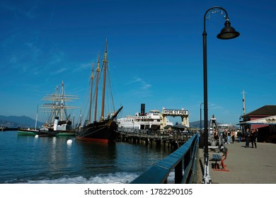 SAN FRANCISCO, CALIFORNIA, USA 09/11/2016: Hyde Street Pier historic vessels. Old antique ships at Fisherman's Wharf.  Maritime National Historical Park, travel destination, culture tourist attraction