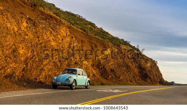 San Francisco, California, USA. 12. 23. 2017. A Blue Bug\
California retro VW Beetle, waiting for it`s owner on the side of\
the road. 
