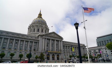 San Francisco, California / USA - July 8, 2019: San Fransisco City Hall - US Flag Waves