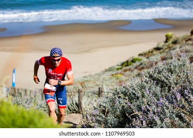 San Francisco, California, USA - June 3, 2018: Ben Kanute Ascends The Sand Stairs At Baker Beach En Route To Winning The 2018 Escape From Alcatraz Triathlon.