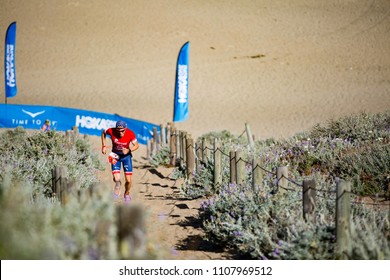 San Francisco, California, USA - June 3, 2018: Ben Kanute Ascends The Sand Stairs At Baker Beach En Route To Winning The 2018 Escape From Alcatraz Triathlon.