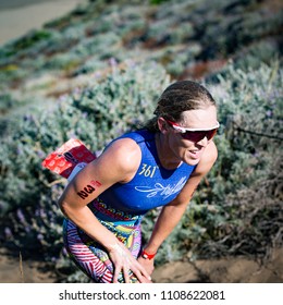 San Francisco, California, USA - June 3, 2018: Alicia Kaye Climbs Up The Sand Stairs At Baker Beach En Route To A Second Place Finish At The 2018 Escape From Alcatraz Triathlon.