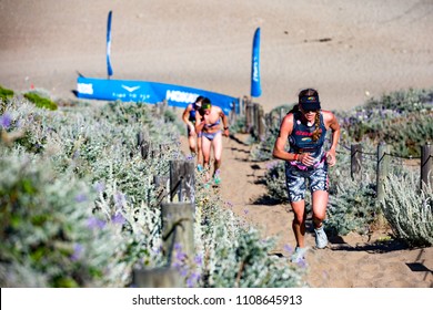 San Francisco, California, USA - June 3, 2018: Sarah Haskins Climbs The Sand Stairs At Baker Beach En Route To Winning The 2018 Escape From Alcatraz Triathlon.