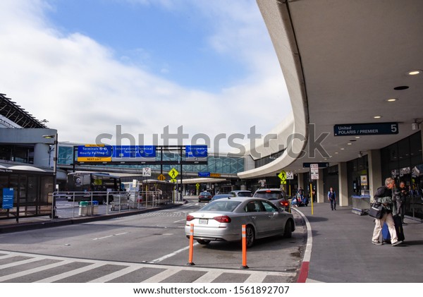 San Francisco, California/USA-11/15/19:
Exterior of San Francisco International Airport, roadway to and
from freeway for drop off and pick-up entrance of building showing
sign post, information.