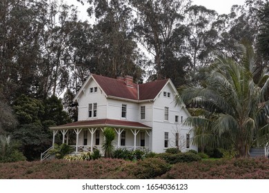 San Francisco, California/USA-2/22/20: Presidio Historical Military Built Building  Surrounded By Tall Eucalyptus Trees Green Natural Flowering Foilage A Military Base Now The Presidio National Park