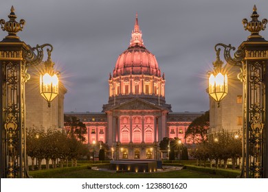 San Francisco City Hall Illuminated In Amber In Thanksgiving Eve. Shot From Outside The War Memorial Courtyard, San Francisco, California, USA.