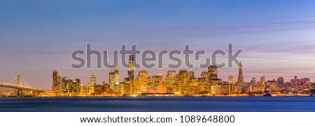 San Francisco downtown skyline at dusk from Treasure Island, California, sunset, USA. Panorama