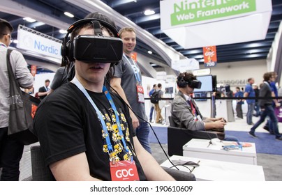 SAN FRANCISCO - MARCH 20: Oculus VR unveiling the second version of The Rift, its Virtual Reality headset for PC just before being bought by Facebook at GDC 2014 on March 20, 2014 in San Francisco, CA