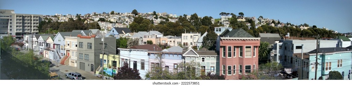 San Francisco - March 26, 2010:  Aerial View Of Houses, Cars. Cityscape, Streets, And Mountians In Potrero Hill Neighborhood With Bird In The Air, Power-lines And Cars Parked On Street.
