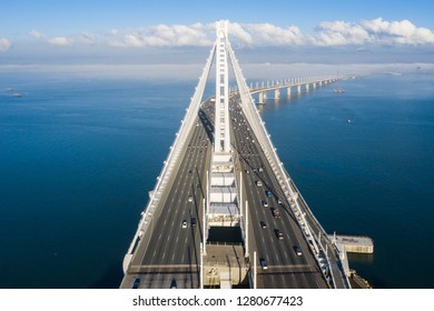 San Francisco - Oakland Bay Bridge Above Layer Or Low Fog