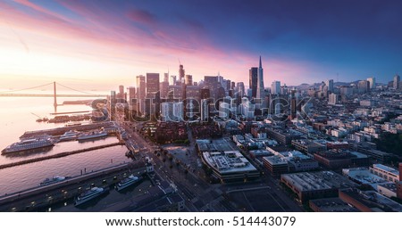San Francisco panorama at sunrise with waterfront and downtown. California theme background. Art photograph.