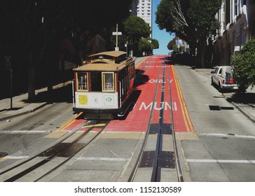 SAN FRANCISCO, UNITED STATES: Old Style Muni Metro Running On Rail Tracks On The Street Of San Francisco.