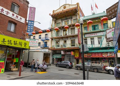 San Francisco, USA - April 19,2018 : Street view of China Town with people walking on the street in San Francisco,USA on April 19,2018.