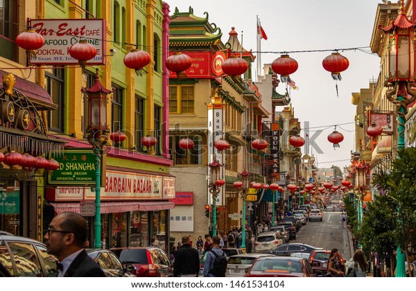 San Francisco, USA - August 19, 2018, daytime in\
Chinatown in San Francisco, USA. walk people stand and drive cars.\
Chinatown San Francisco is one of the largest Chinatowns in North\
America. It is