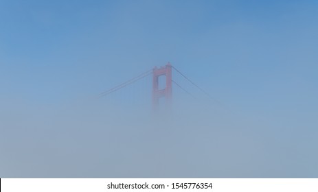 San Francisco, USA - August 2019: Golden Gate Bridge Inside Fog, Only Single Tower Visible