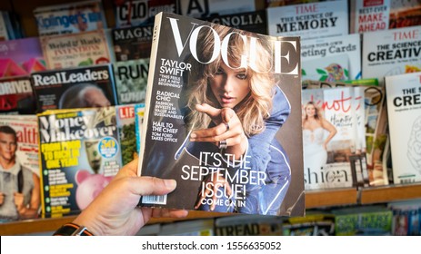 San Francisco, USA - August 2019: Hand Holding A Copy Of Vogue Magazine With Taylor Swift On Cover