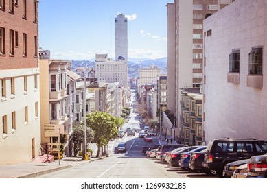 SAN FRANCISCO, USA - February 12, 2018: Cars Park In A Row On A Steep Hill San Francisco Famous Post Card Vintage Colors