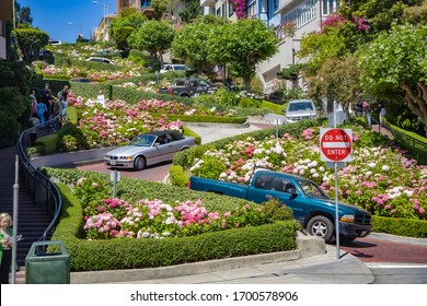 San Francisco, USA - July 23, 2008:  cars passing the Lombard street in San Francisco. It is  known for the  section on Russian Hill between Hyde and Leavenworth, in which the roadway has eight turns.