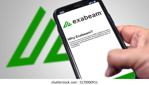 San Francisco, USA, June 2022: Hand Holding A Phone With Exabeam Mobile Application On Screen. Exabeam Is A Leading Provider Of The Software For Analyzing User And Company Behavior