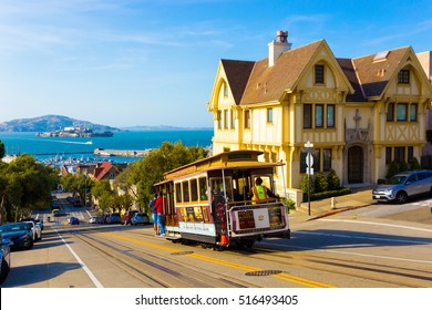 San Francisco, USA - May 12, 2016: Combined scenic view of San Francisco Bay with Alcatraz, cable car, Victorian houses, typical iconic siteseeing landmarks and tourist attractions of the city