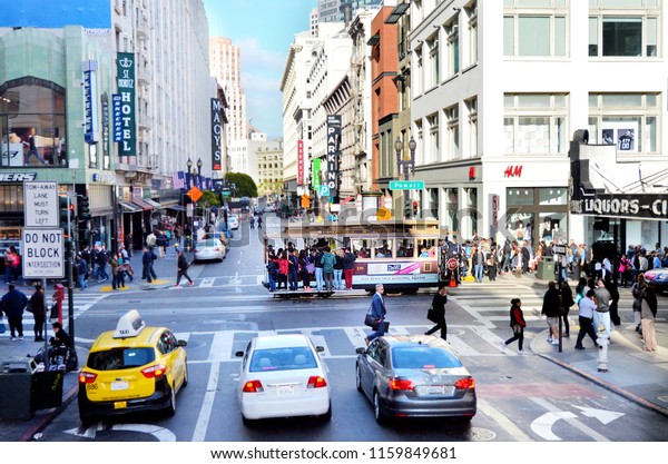 SAN FRANCISCO, USA - MAY 19 2015:Traffic on\
Powell Street.San Fransisco has a density of about 18,187 people\
per square mile (7,022 people per km2), making it the most densely\
large city in California