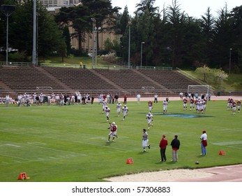 SAN FRANCISCO-APRIL 17: Player Reaches For Football Pass At Kezar Stadium During Stanford 2010 Practice Game.  Taken April 17 2010 At Kezar Stadium In San Francisco California