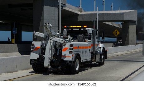 San Francisco,CA-6/8/2018:Caltrans California Department Of Transportation Maintenance Tow Truck Responds An Freeway Accident With Fire Damage On The San Francisco -Oakland Bay Bridge