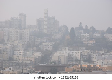 San Francisco,California,United States - November,16,2018 - Aerial Haze View Of Lombard Street With Building In Smoke Produced By Wildfire. Very Unhealthy Toxic Fire Air Pollution