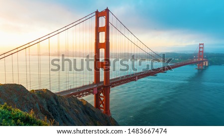 San Francisco's Golden Gate Bridge at sunrise from Marin County